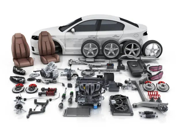 Car body surrounded by its engine, wheels, seats and spare parts