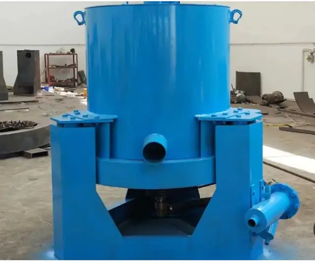 Blue centrifugal gravity concentrator in a workshop